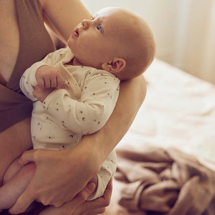 SPARKLE rib body med kryds lukning