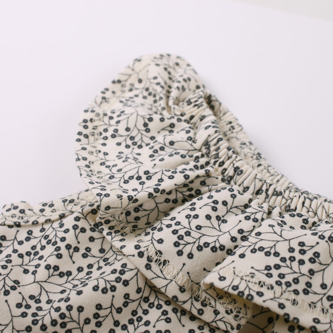 RE-LOVED PETIT ærmeløs body med skørt